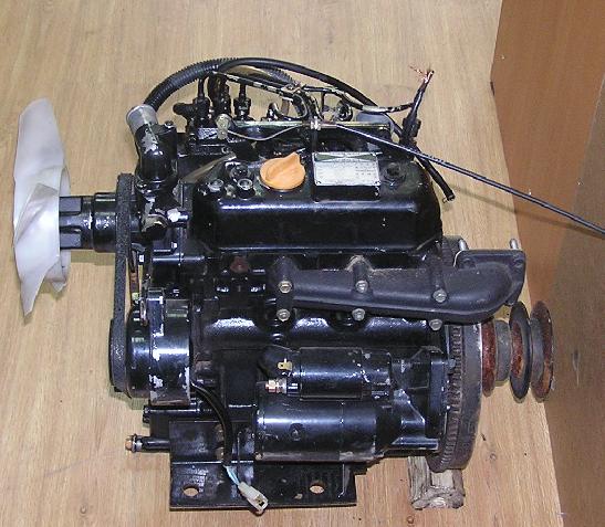 Двигатель трактор б. ДВС Yanmar 2tr27. Двигатель Кубота z 600. Двигатель Янмар 3tnb82-u. 15 Лс Янмар двигатель.