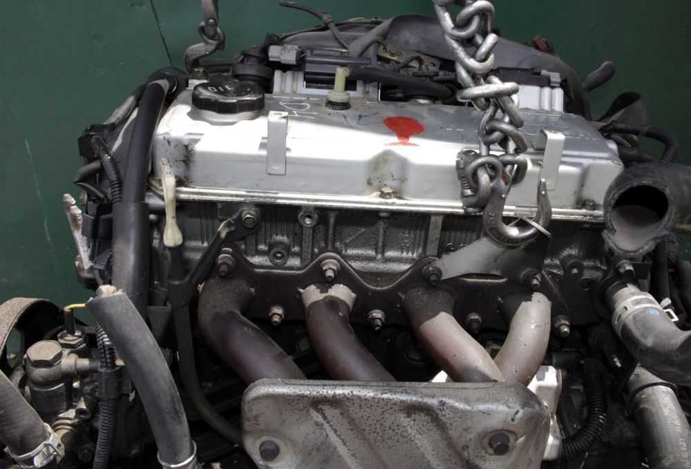Мицубиси 4g64. Двигатель Мицубиси 2.4 g64s4m. Двигатель 4 g 64 Митсубиси. Мотор 4g64 Mitsubishi 2.4. Двигатель Митсубиси Галант 2.4 4g64.